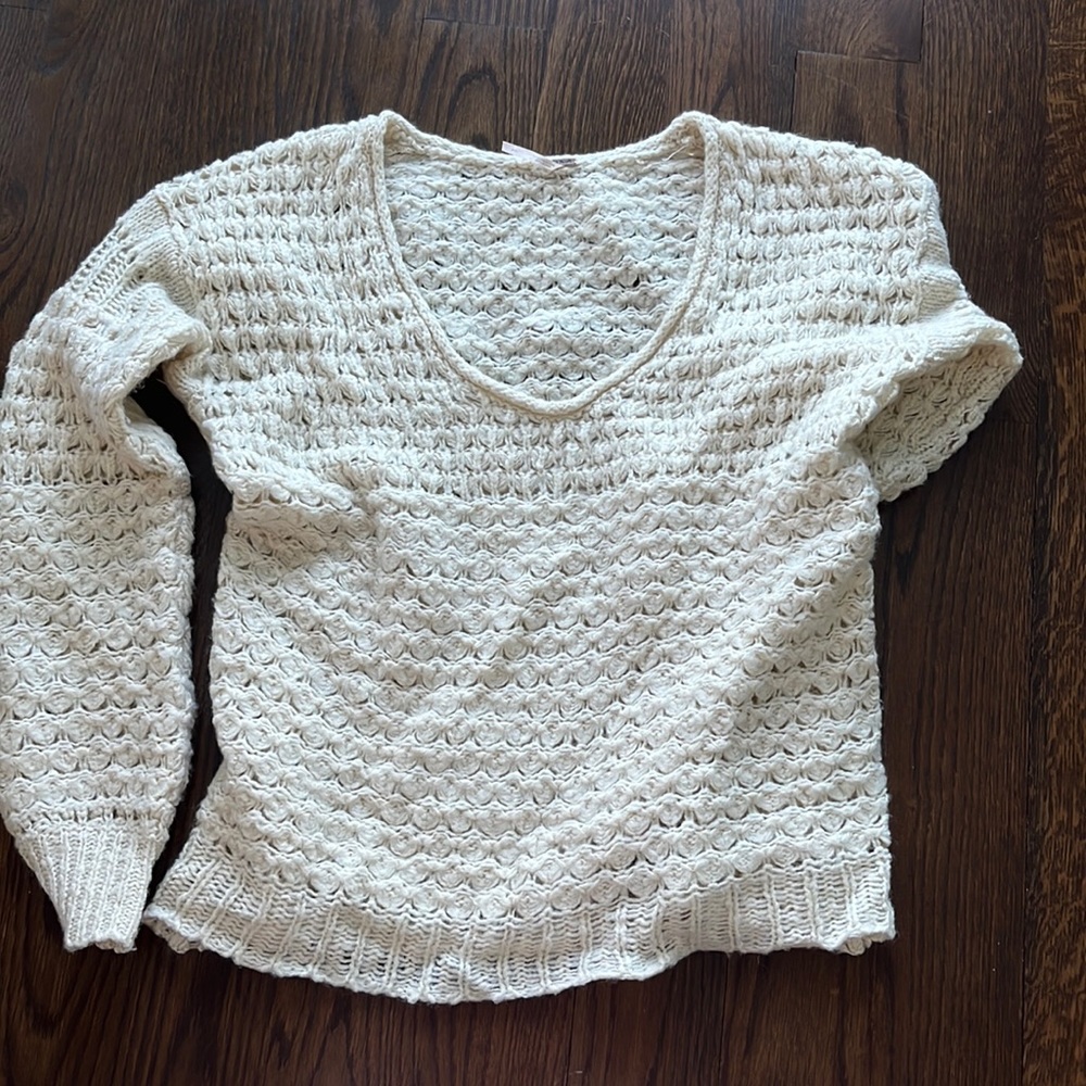 Free people sweater, cream color size small
